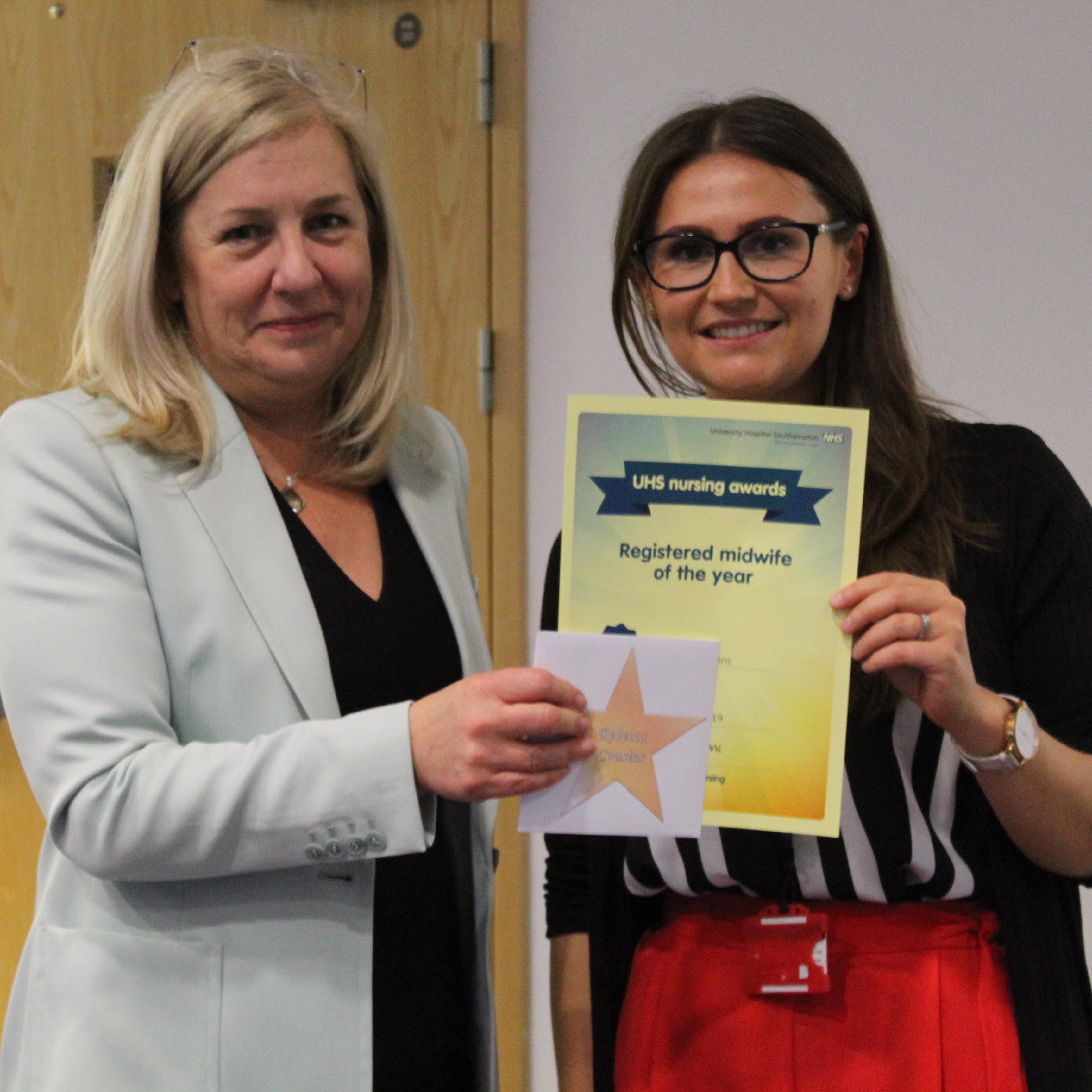 Rebecca Cousins, registered midwife of the year, with Gail Byrne, director of nursing 