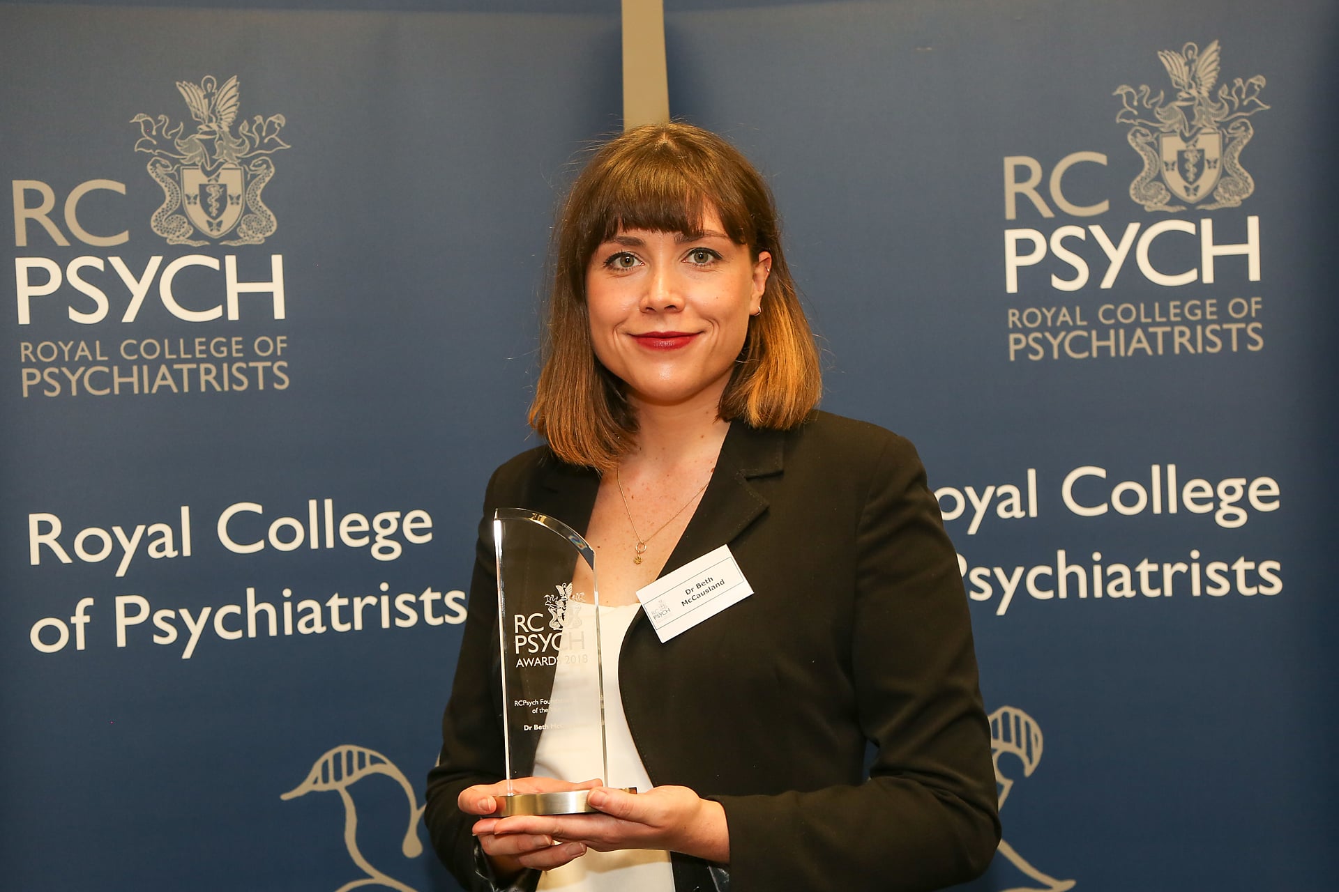 Dr Beth McCausland, quality improvement fellow in dementia care, with the foundation doctor of the year award