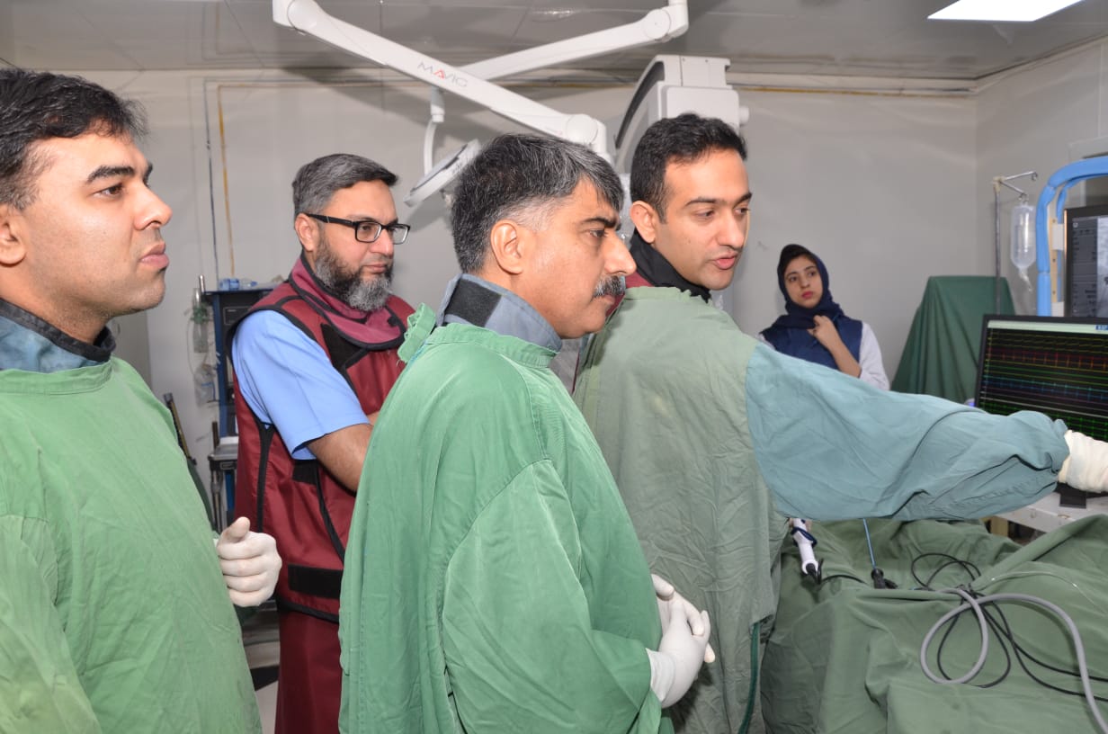 Dr Waqas Ullah, consultant cardiologist, training staff in Pakistan