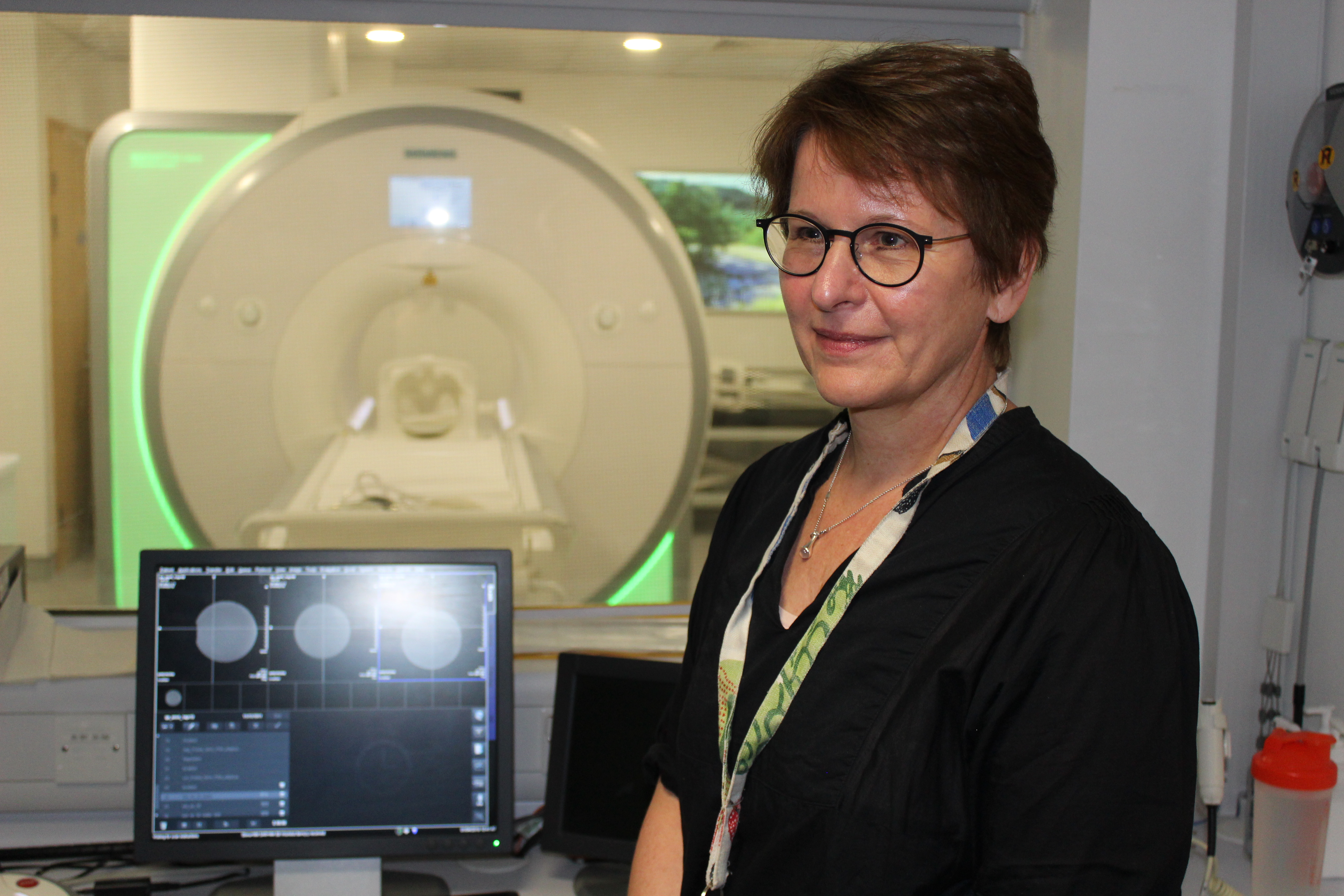 Dr Brigitte Vollmer, consultant in neonatal neurology, with a MRI equipment