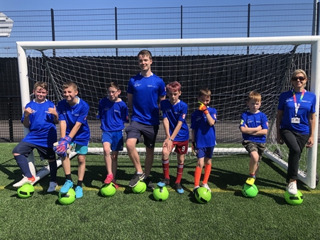 SCH youth football team with Sarah Shameti (UHS) and Glenn Brailey (FA)