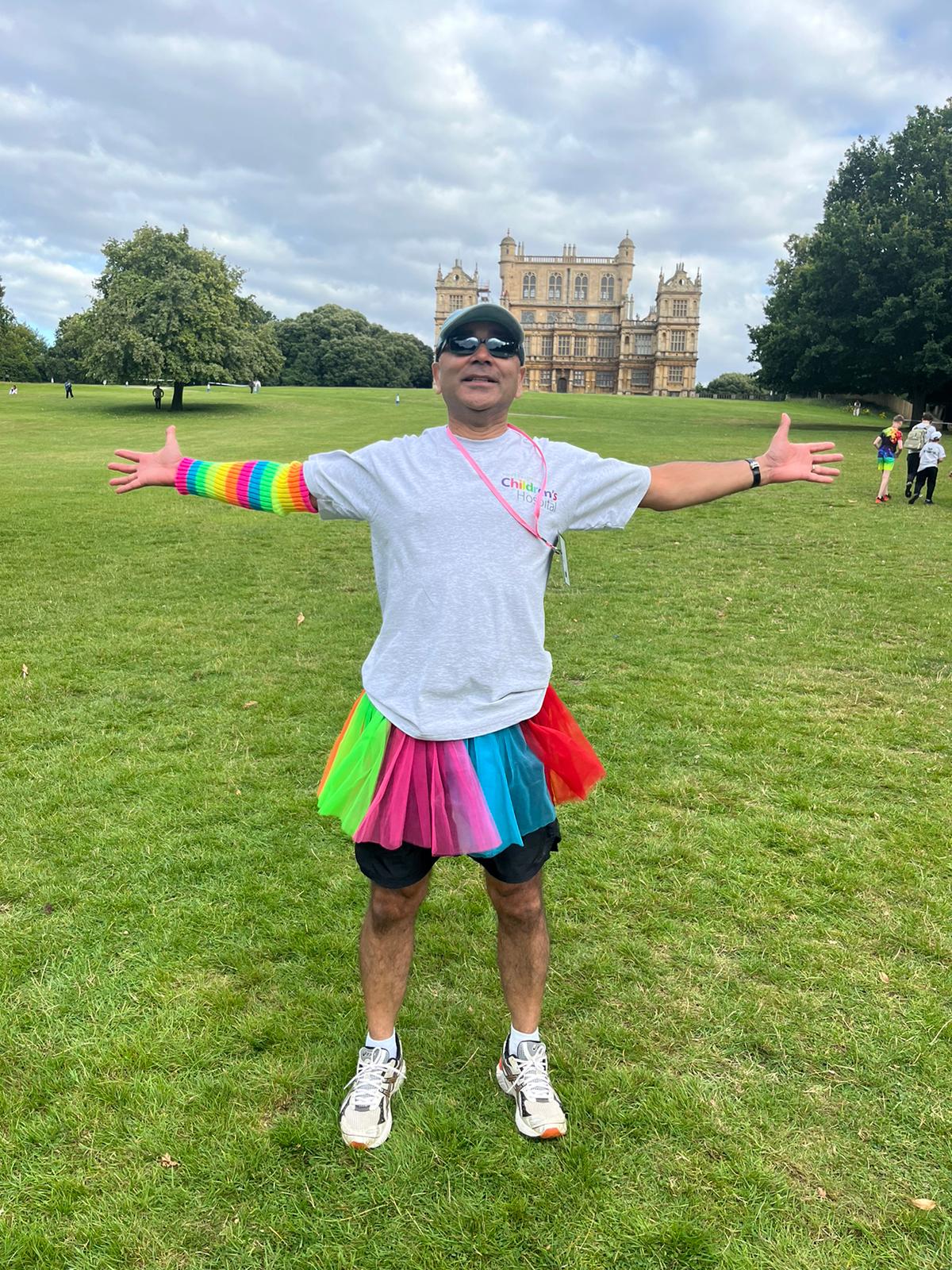 Image shows Shuman Haq in his colourful tutu cheering on the team.