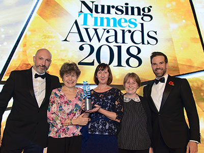 Debbie Fudge, tuberculosis liaison nurse, and her team collecting Nursing Times Award 