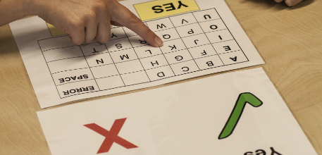 A grid of letters and symbols used to help patients to communicate.