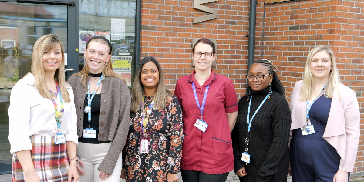 Six female UHS staff members working in healthcare science